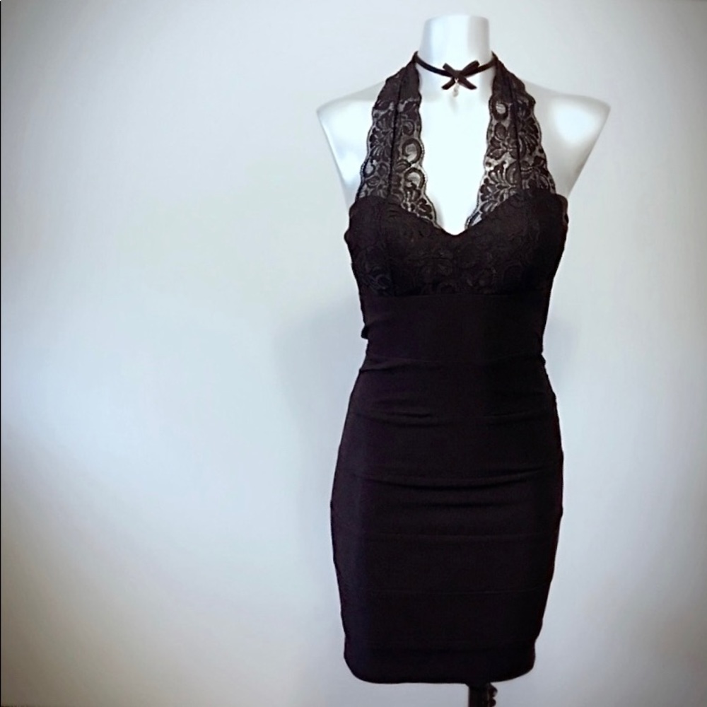 Form Fitting Little Black Dress with Lace Detail